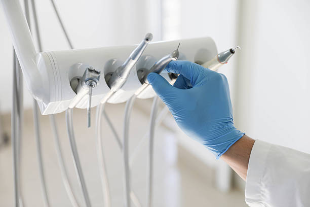 Professional Tooth Extraction technician working in Sunrise, FL